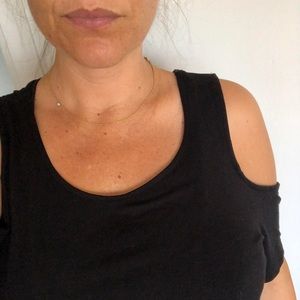 Black maternity shirt with shoulder cutouts